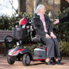 Image of Drive Medical Ventura DLX 4 Wheel Scooter With Woman Riding View