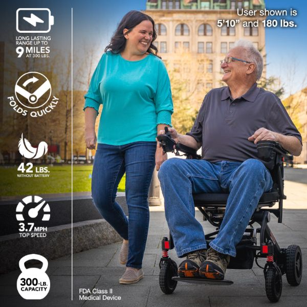 Rascal Carbon Cruiser Folding Power Wheelchair with a Man Riding on it