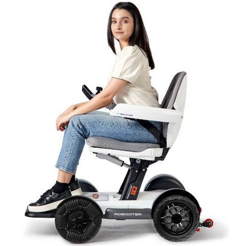 Robooter X40 Folding Electric Wheelchair Side View with Rider