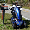 Image of EV Rider Vita Monster 4 Wheel Scooter Heartway - S12X Blue Front  View with Passenger 