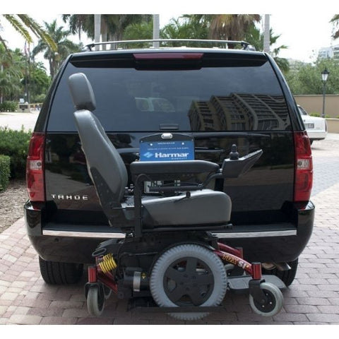 Harmar AL580XL Power Wheelchair Lift securely attached to the vehicle View