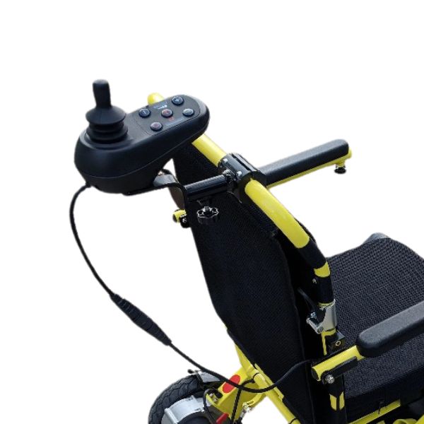 Attendant controller bracket installed on a yellow AirHawk electric wheelchair