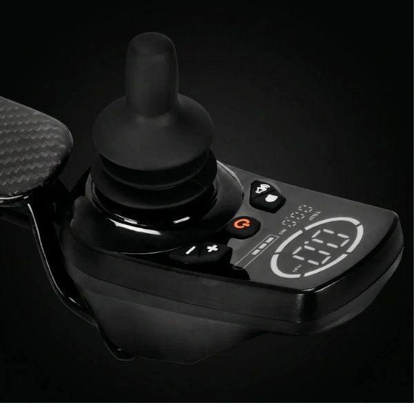 Black joystick controller with digital display on a dark background