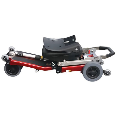 FreeRider Luggie Classic II Travel Scooter Red Classic Color Folded Flat on the Floor View