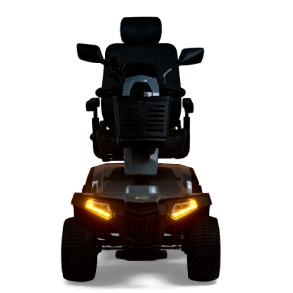 Golden Technologies Eagle All-Terrain 4-Wheel Mobility Scooter with glowing orange headlights on a white background