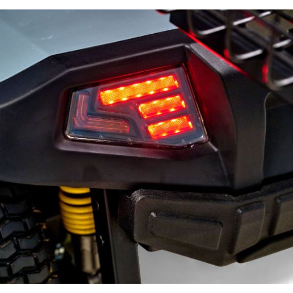 Close-up of the Golden Technologies Eagle All-Terrain 4-Wheel Mobility Scooter's taillight with red and orange lights
