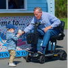 Image of Buzzaround CarryOn HD 4-Wheel Mobility Scooter with a Man Seating on it