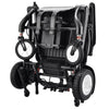 Image of Matrix Ultra Carbon Fiber Portable Electric Wheelchair By Discover Your Mobility in Black Frame Folded Back View