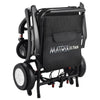 Image of Matrix Ultra Carbon Fiber Portable Electric Wheelchair By Discover Your Mobility in Black Frame Folded Front View