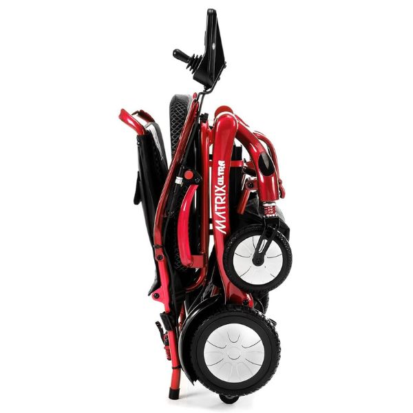 Matrix Ultra Carbon Fiber Portable Electric Wheelchair By Discover Your Mobility in Red Frame Folded Side View
