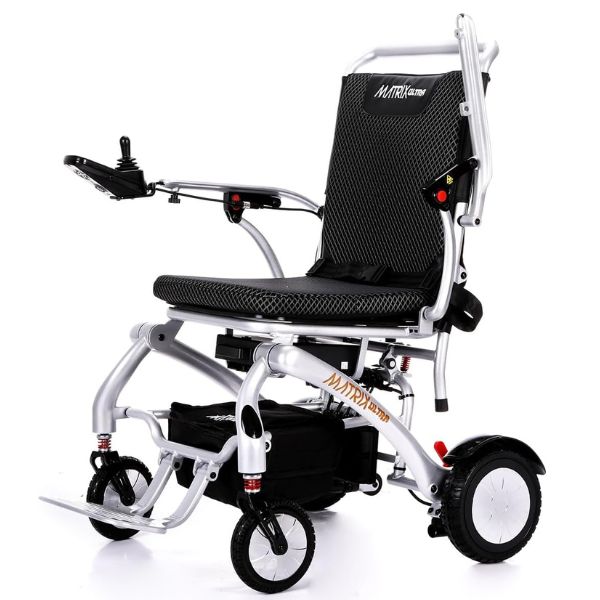 Matrix Ultra Carbon Fiber Portable Electric Wheelchair By Discover Your Mobility in Siver Frame with the Left Armrest Up