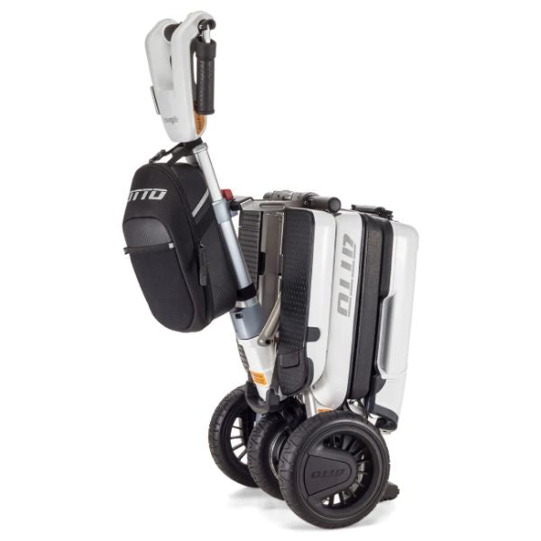 Moving Life Essentials Pouch Shown Slung at a Folded Atto Scooter