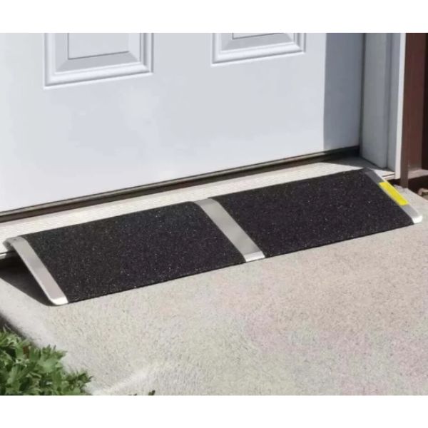 PVI Aluminum Solid Bariatric Threshold Ramp on a white door