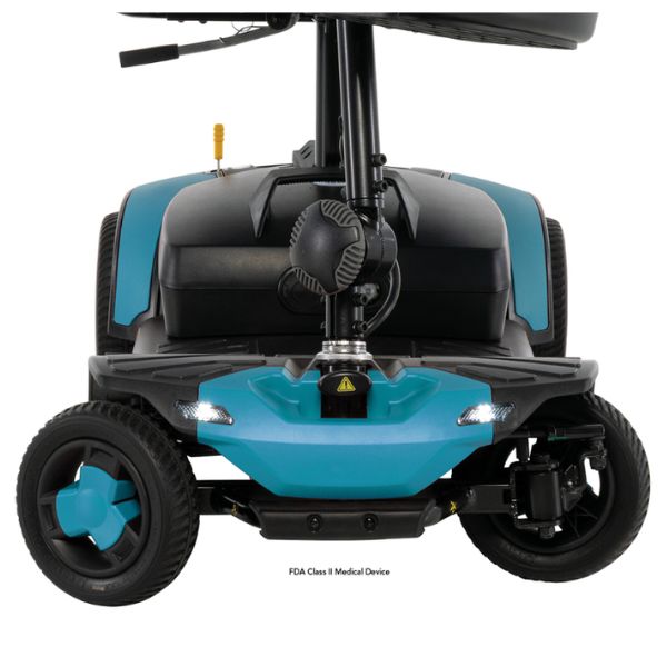 A front-facing view of a Pride Go-Go Elite Traveller Gen 3 Focusing on the EZ Turn Technology feature.