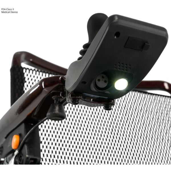 Pride Jazzy Carbon 27 Folding Power Wheelchair with a light on a mesh background