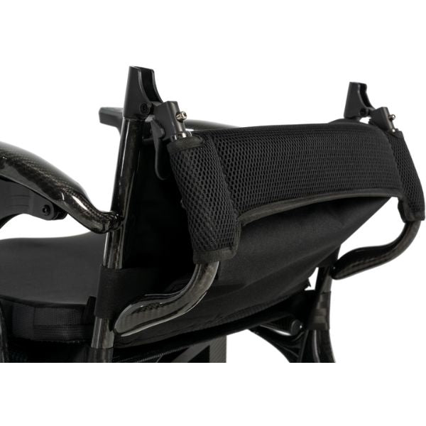 Pride Jazzy Carbon 27X Lightweight Folding Wheelchair with a mesh cover on a white background