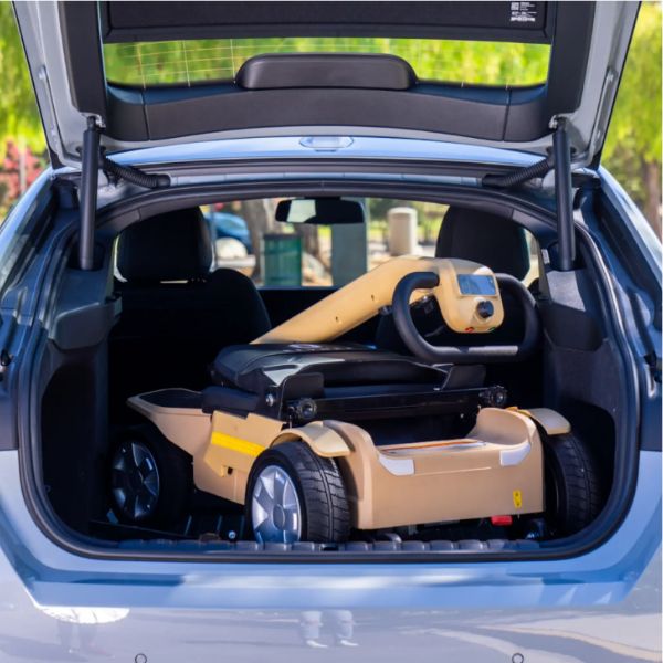 Reyhee Flex 4-Wheel Folding Electric Mobility Scooter Tan Color Folded in The Trunk View