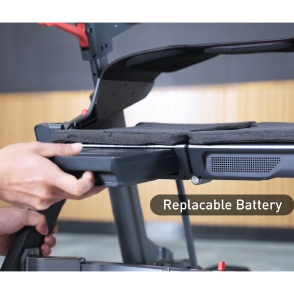Close Up Showing a Hand Releasing the Battery of Roamate 3-in-1 Rollator Transport Electric Wheelchair