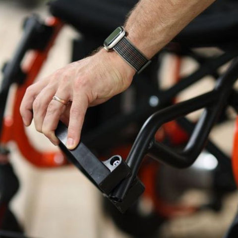 SuperHandy GoRide Folding Electric Wheelchair Foot Rest Being Folded View