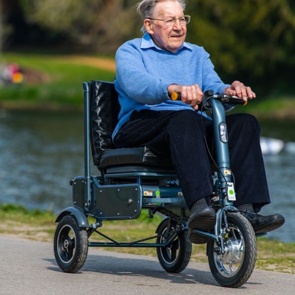 Man riding the eFOLDi Explorer Ultra Lightweight Mobility Scooter