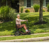 Image of Lady riding the Feather Lightweight Electric Scooter Right Side View