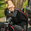 Image of Feather Lightweight Electric Scooter being carried all folded up