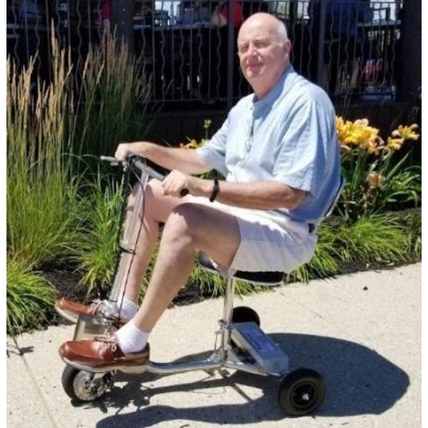 HandyScoot Folding 3 Wheel Travel Mobility Scooter Side View with Passenger