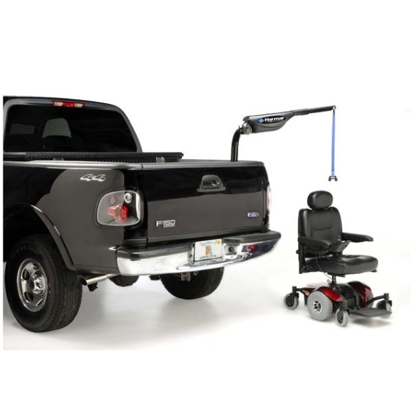 A photo of the Harmar AL425 Axis II adjustable base and boom for electric wheelchairs, showcasing its sturdy construction and versatility.