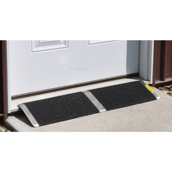 A threshold ramp designed for doorways that swing into view.